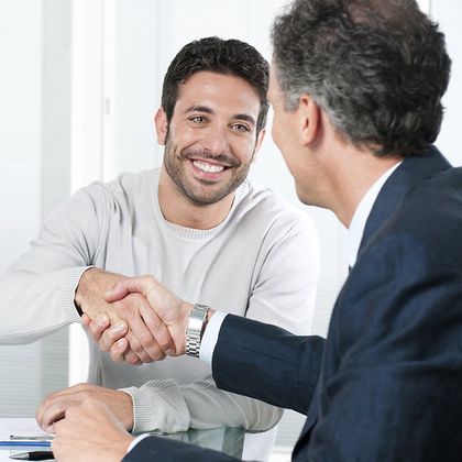 An Agent and a Client Shaking Hands — Kissimmee, FL — Taxes International Inc An Agent and a Client Shaking Hands — Kissimmee, FL — Taxes International Inc