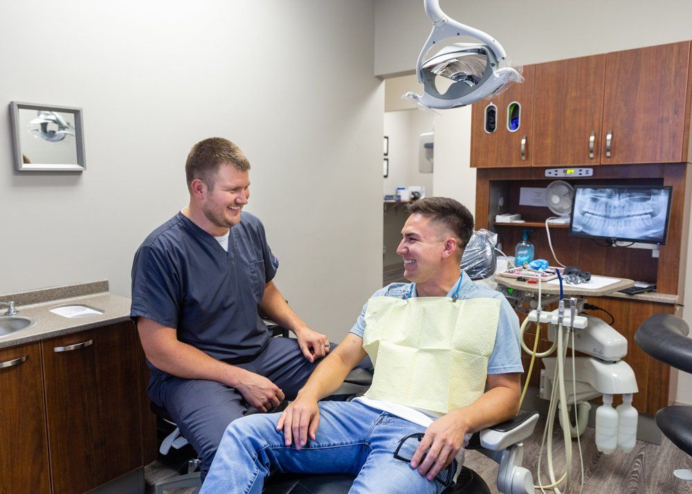 Ozone Dentistry — Dentist and Patient Having a Laugh in Jasper, IN