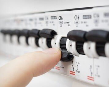 Finger Flipping Switch on Fusebox - Electrical in North Attleboro, MA Finger Flipping Switch on Fusebox - Electrical in North Attleboro, MA