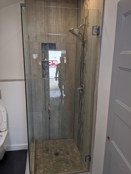 Man taking picture of shower — Greater Nashville, TN — All Star Glass Man taking picture of shower — Greater Nashville, TN — All Star Glass