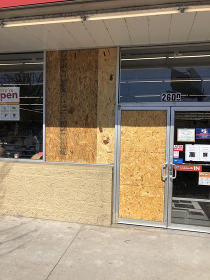 Other angle of window and door being repaired covered by wood panel — Greater Nashville, TN — All Star Glass Other angle of window and door being repaired covered by wood panel — Greater Nashville, TN — All Star Glass