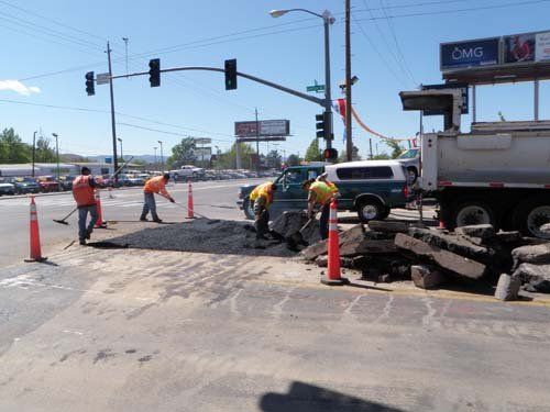 Local — Workers Putting Asphalt on Road in Sparks, NV