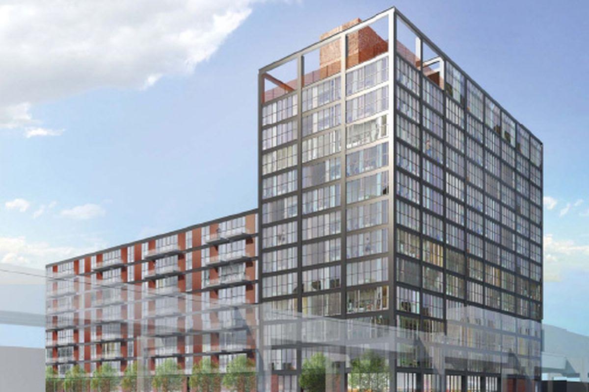 An artist 's impression of a large building with lots of windows