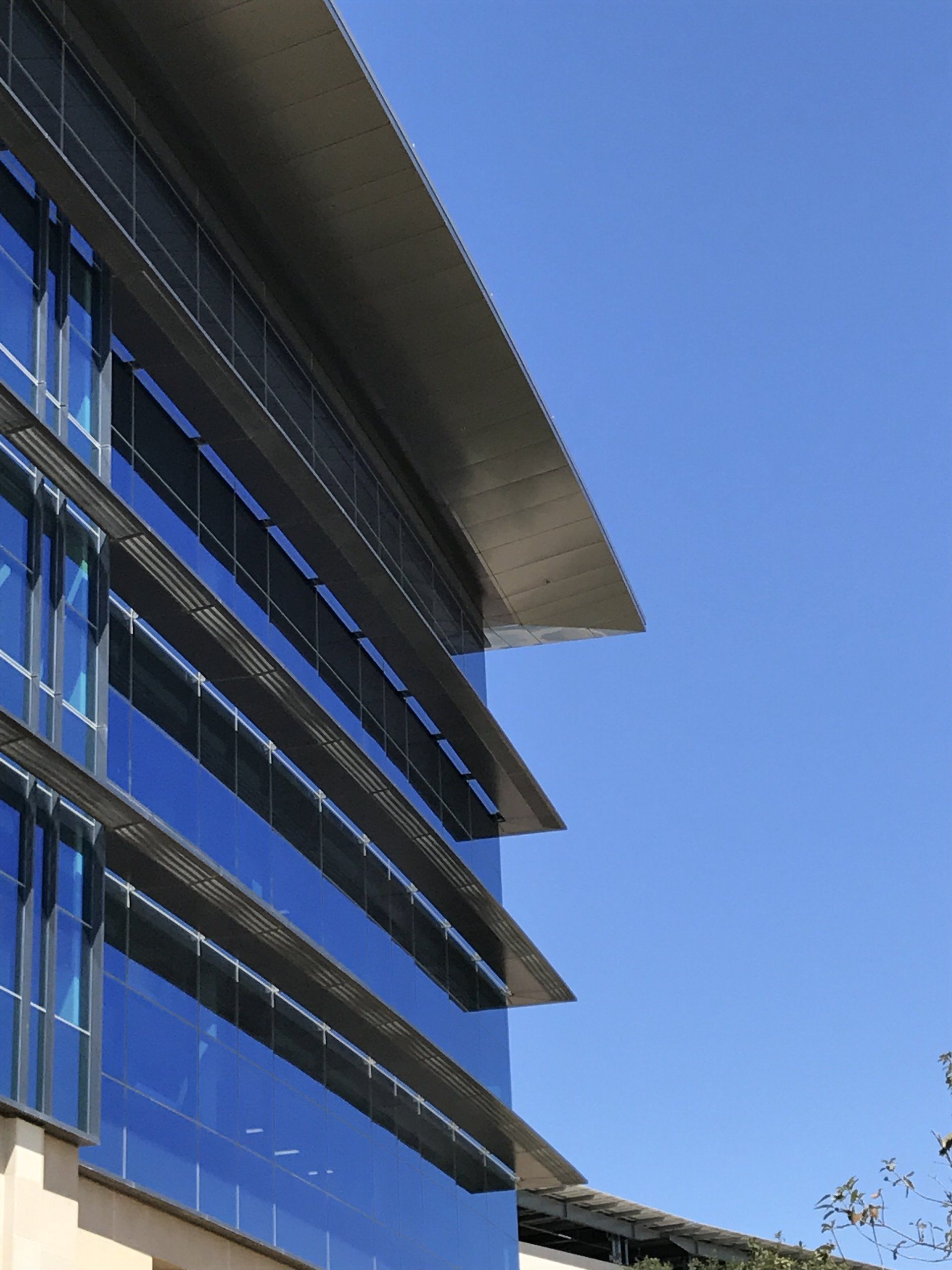 A building with a blue sky in the background