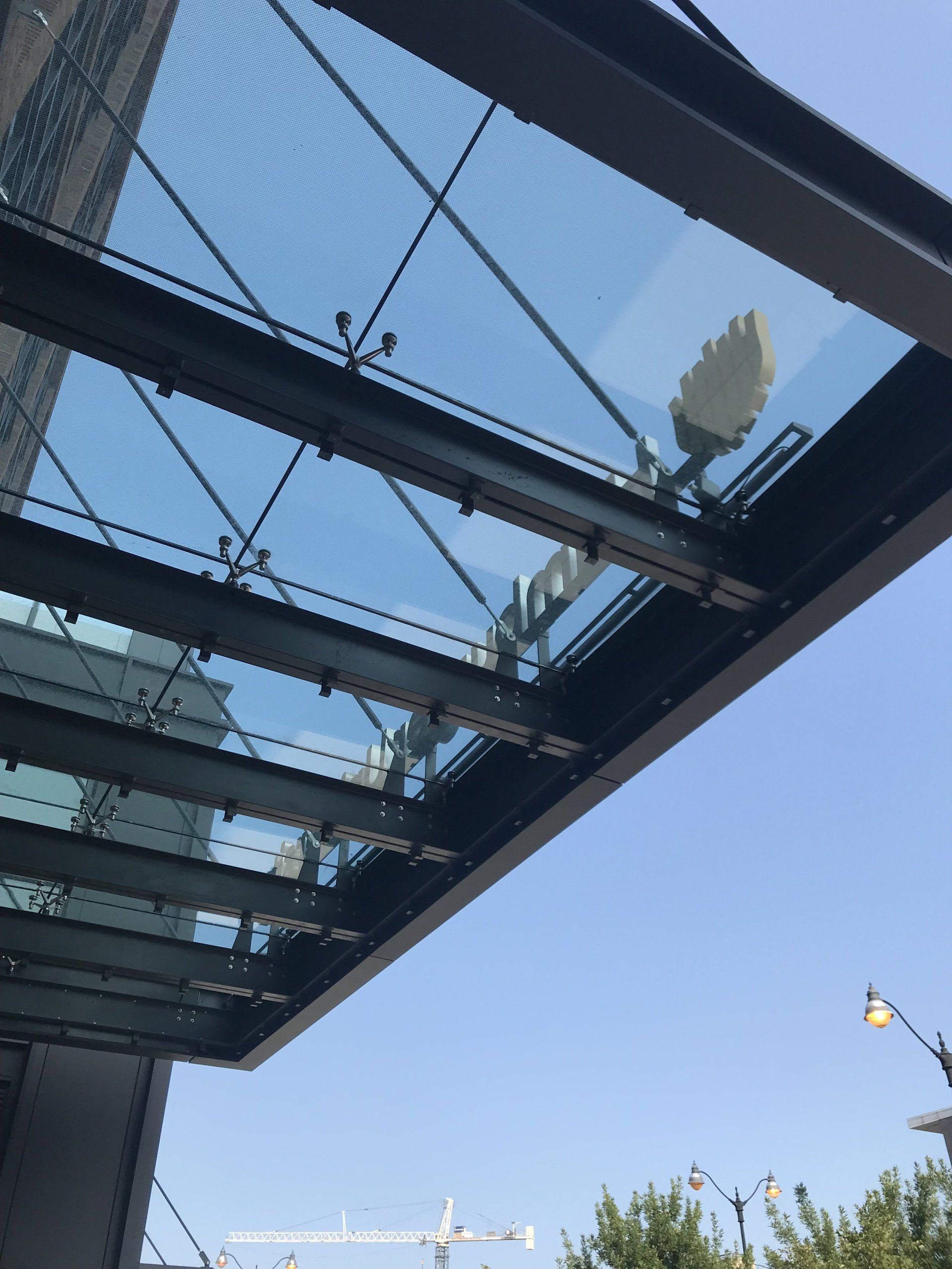 A building with a glass roof and a sign that says ' lg ' on it