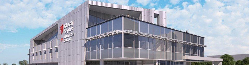 An artist 's impression of a large building with a lot of windows.
