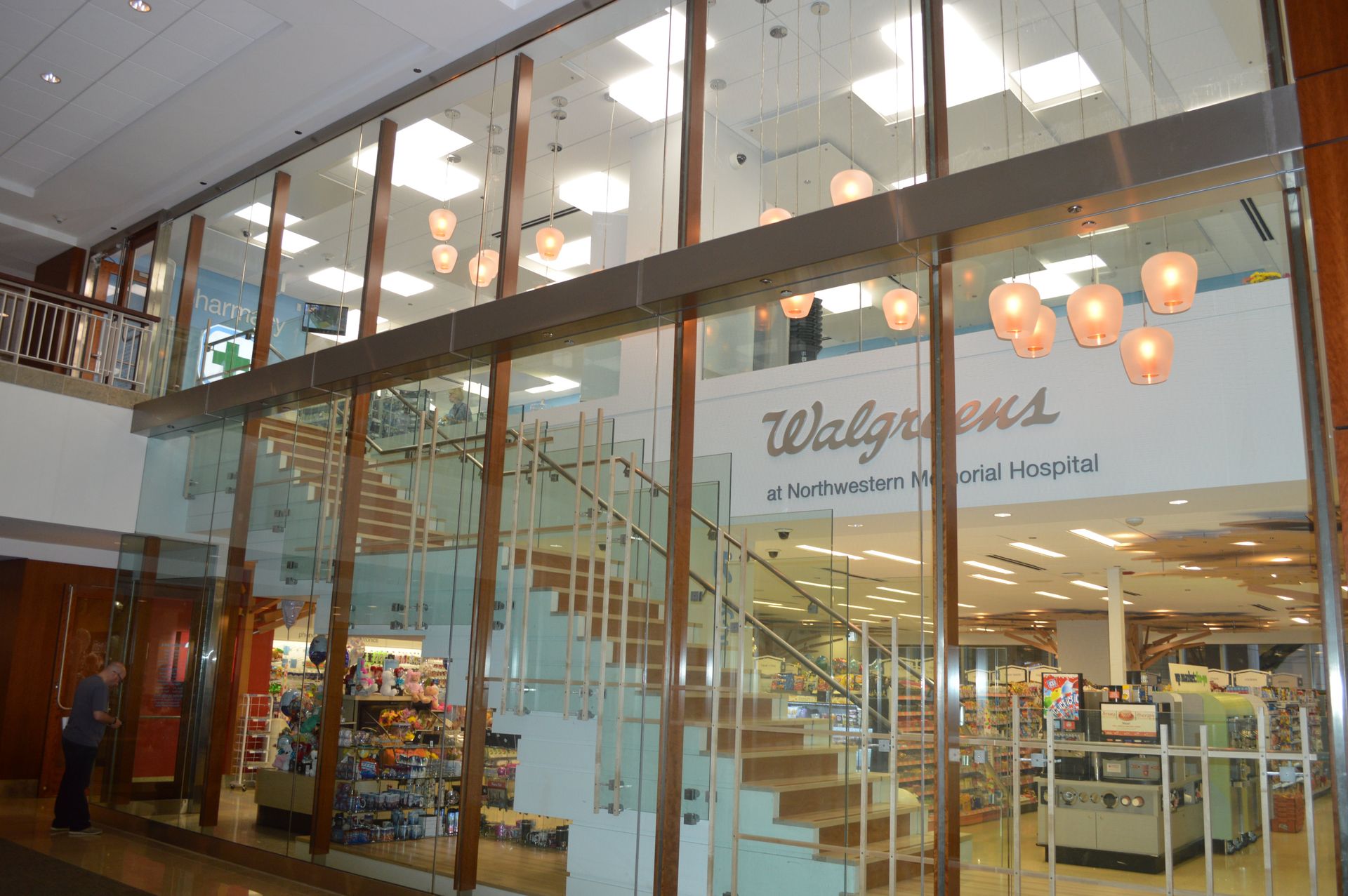A walgreens store with stairs leading up to the second floor