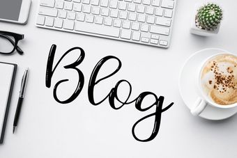 blog text on table with various items