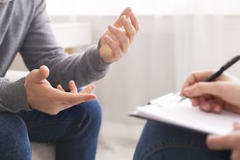 person in counseling session