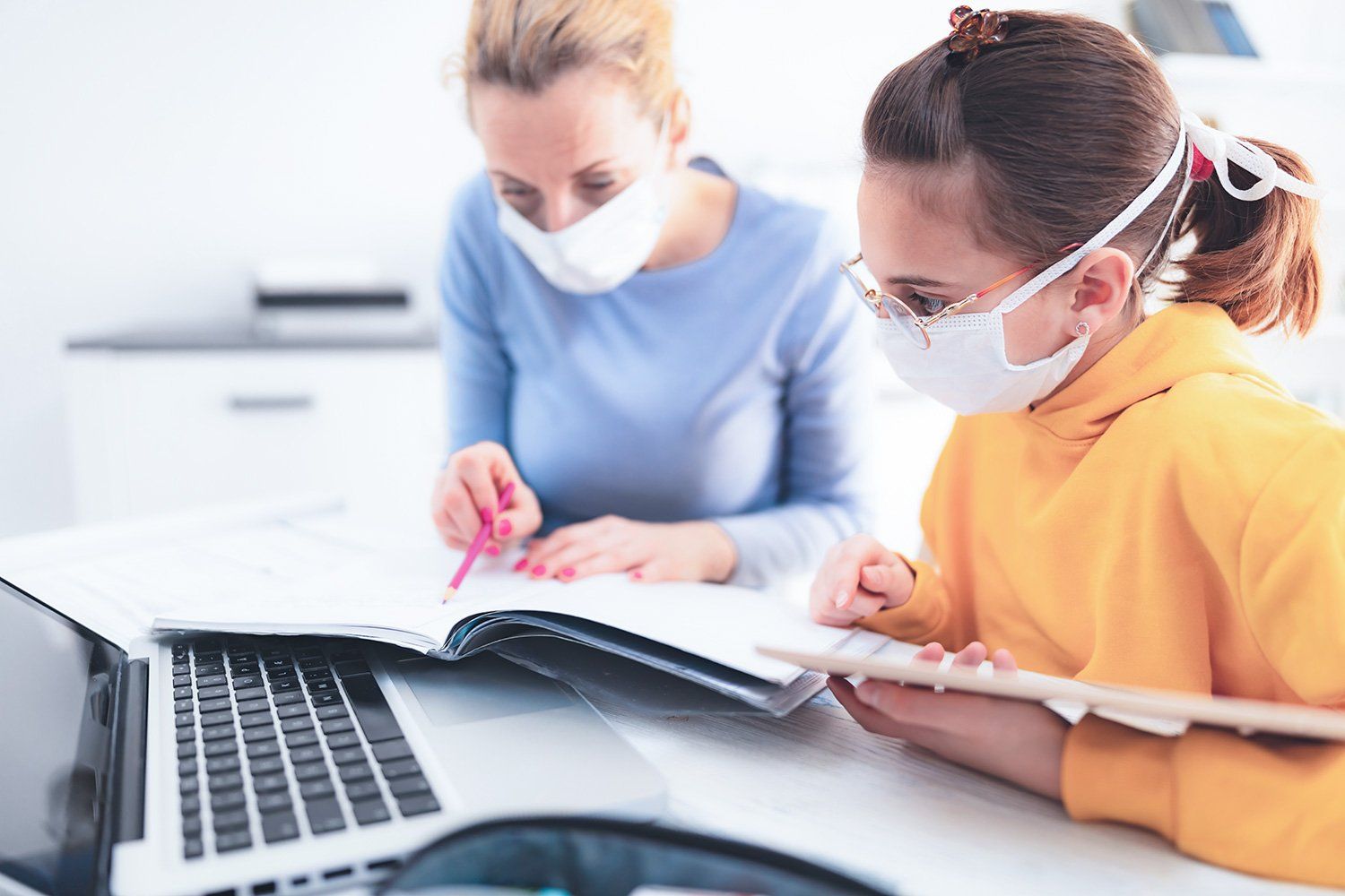Tutor and student working image