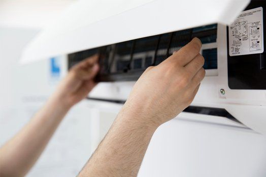 AC system being serviced