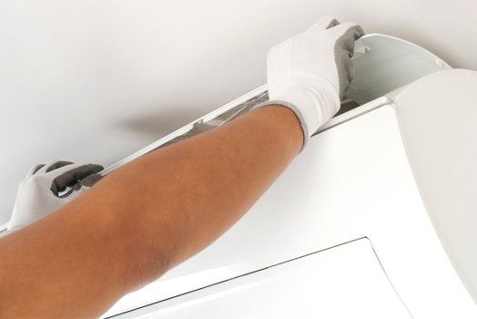 AC system being repaired