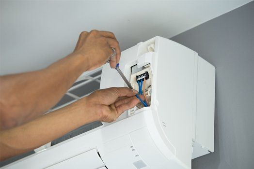 AC system being serviced