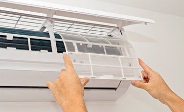maintenance work on an ac unit
