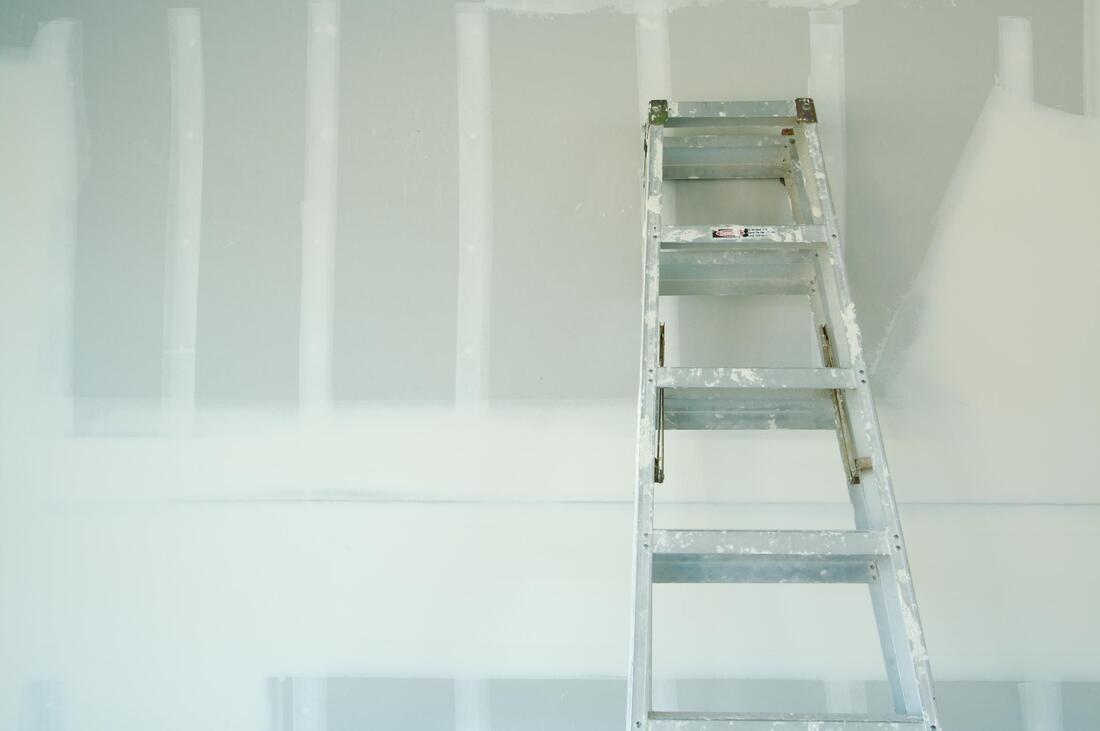 ladder leaning against wall in Orange County, CA