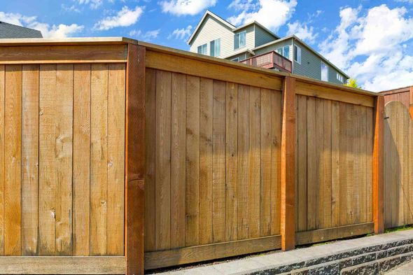 New Backyard Wood Fence — Pascagoula, MS — Gulf Coast Fence Co. New Backyard Wood Fence — Pascagoula, MS — Gulf Coast Fence Co.