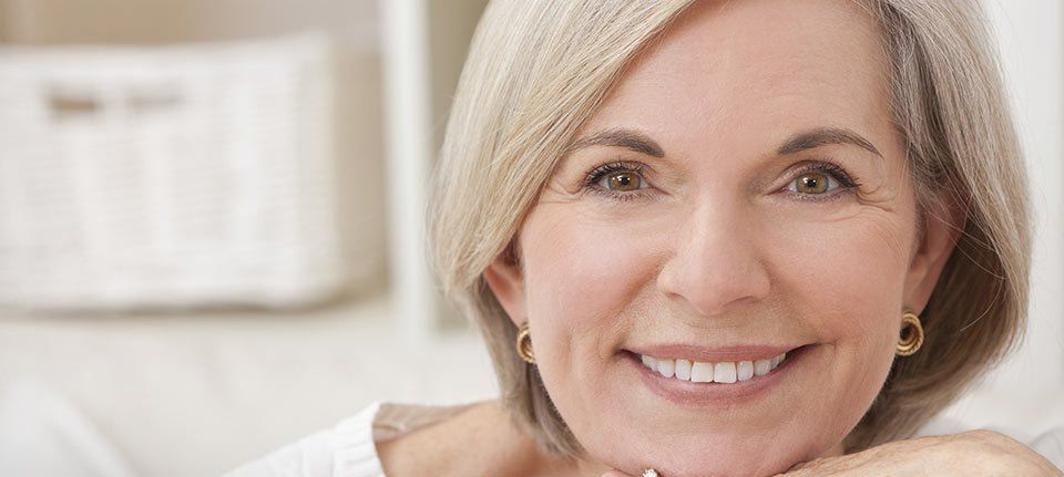 A smiling mature lady with beautiful teeth