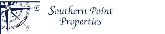 A blue and white logo for southern point properties