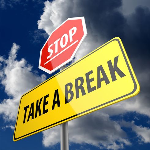 Stop sign above a yellow sign that says, 