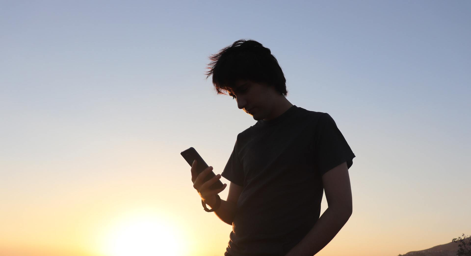 person looking at cell phone