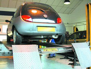 MOT test centre - Tewkesbury - Autostation Ltd - Ford KA in MOT station 