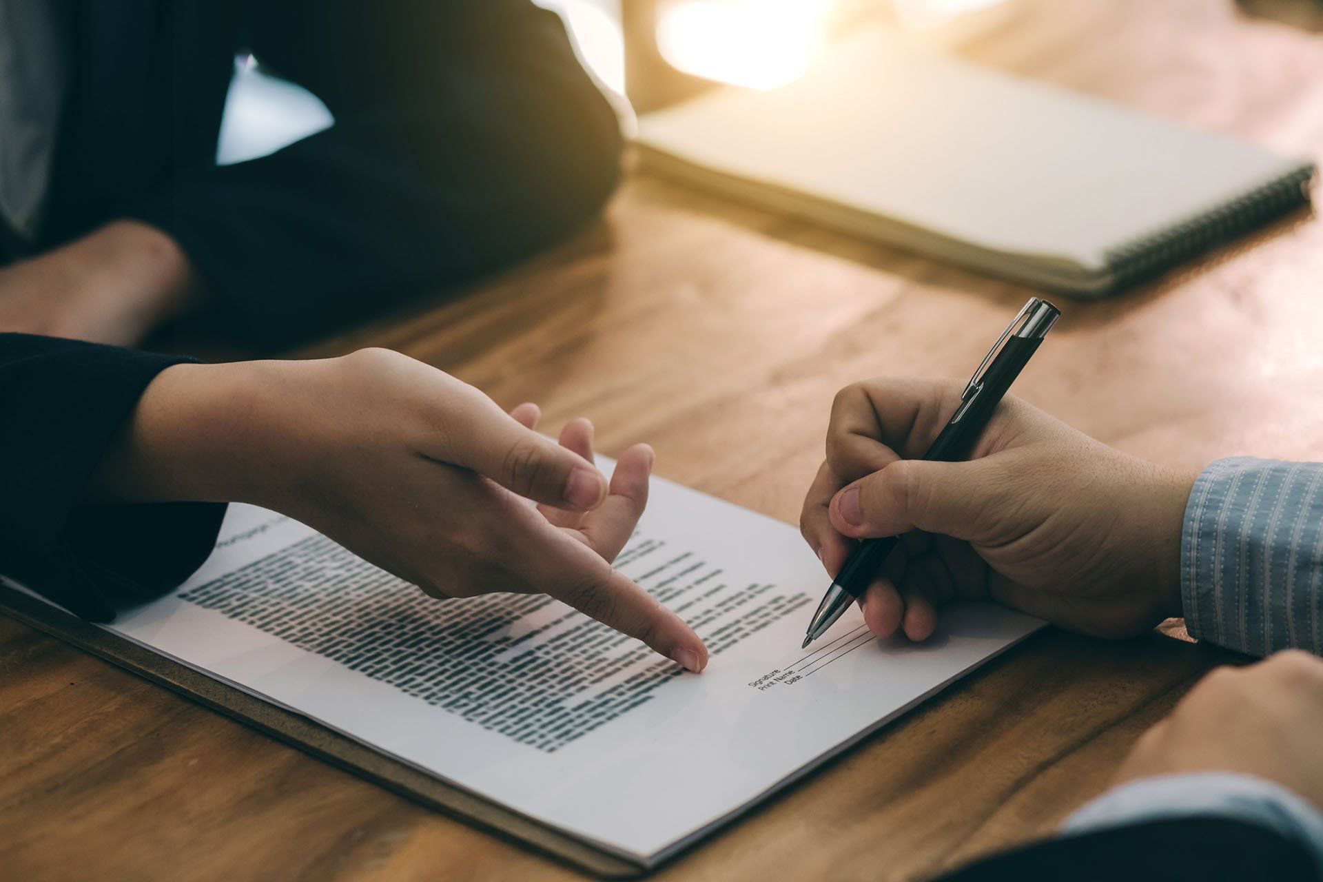 Signing the Agreement — Grand Island, NE — Bradley Law Firm, PC