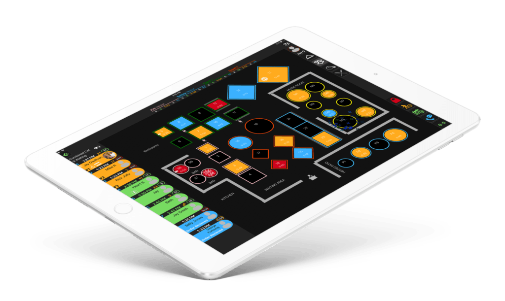 Tablet displaying a dark interface with colorful geometric shapes and controls.
