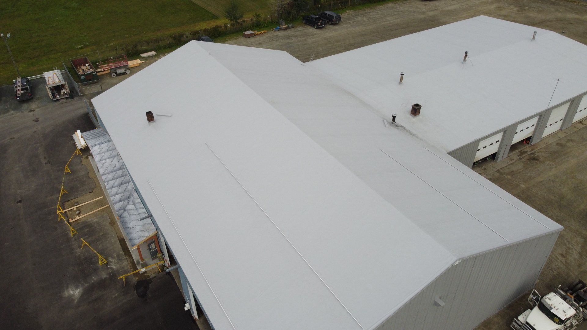 Aerial view of Rodd Roofing’s metal retrofit project on a large industrial building.