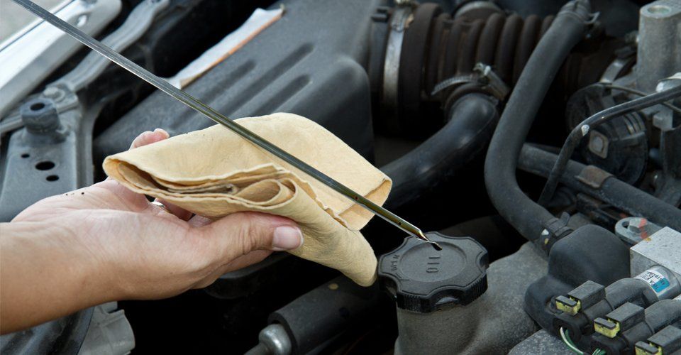 car battery being checked