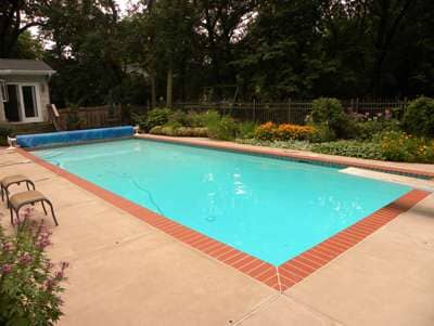 Pool Deck With Lush Gardens