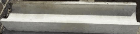 A black and white photo of a set of concrete stairs.
