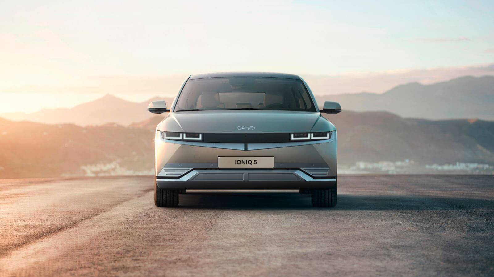 The front end of a hyundai ioniq 5 electric car is shown. 