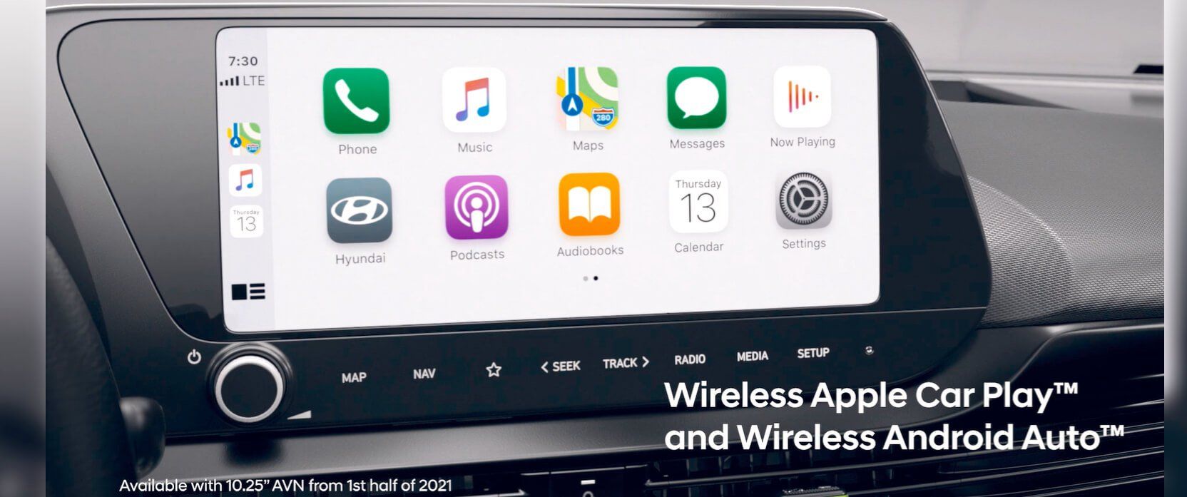 A car dashboard with a wireless apple car play and wireless android auto.