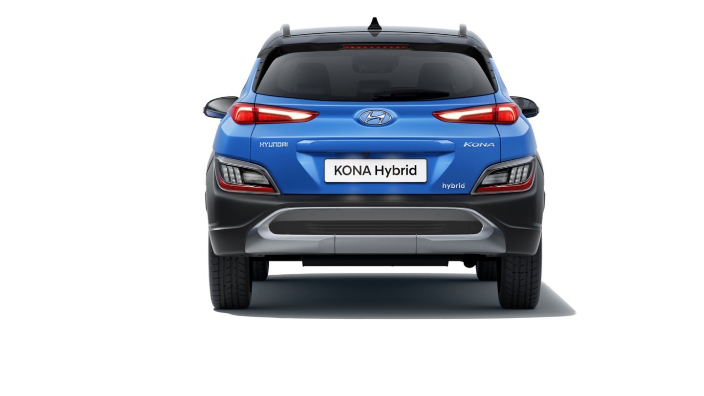 The rear end of a blue hyundai kona is shown on a white background.