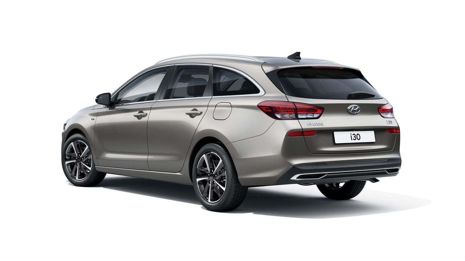 The rear end of a silver hyundai i30 station wagon is shown on a white background.