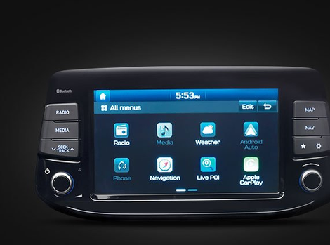 A car radio displays the time as 5:53