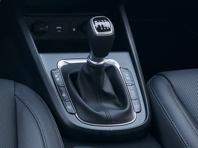 A close up of a shifter in a car
