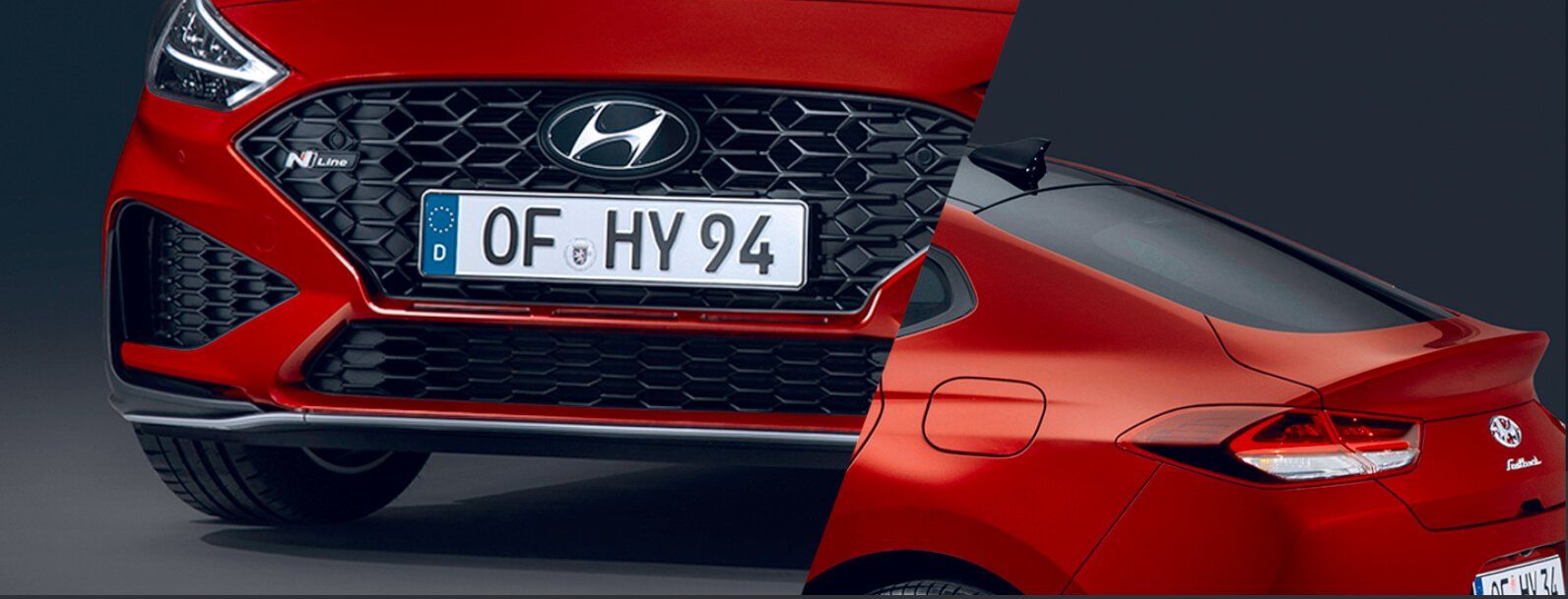 A red car with the hood up and a license plate that says of hy 94.