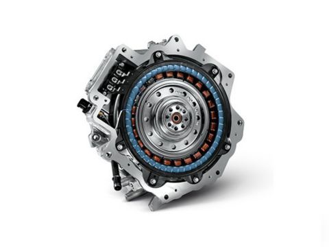 A close up of an electric motor on a white background. Kona Hibrid