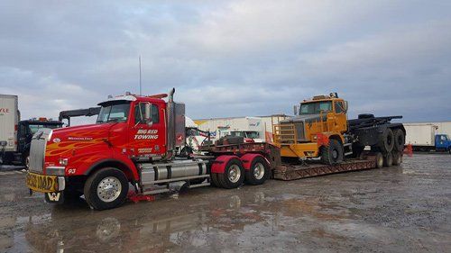 Photo of towing big truck - Heavy Duty Towing in Syracuse, NY