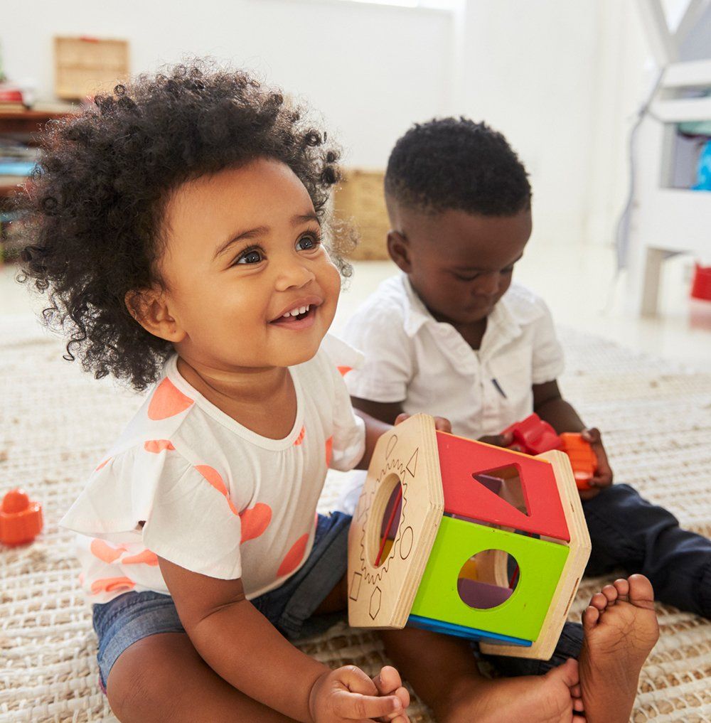 Girl And Boy Playing Toys — Redondo Beach, CA — Carden Dominion School Girl And Boy Playing Toys — Redondo Beach, CA — Carden Dominion School