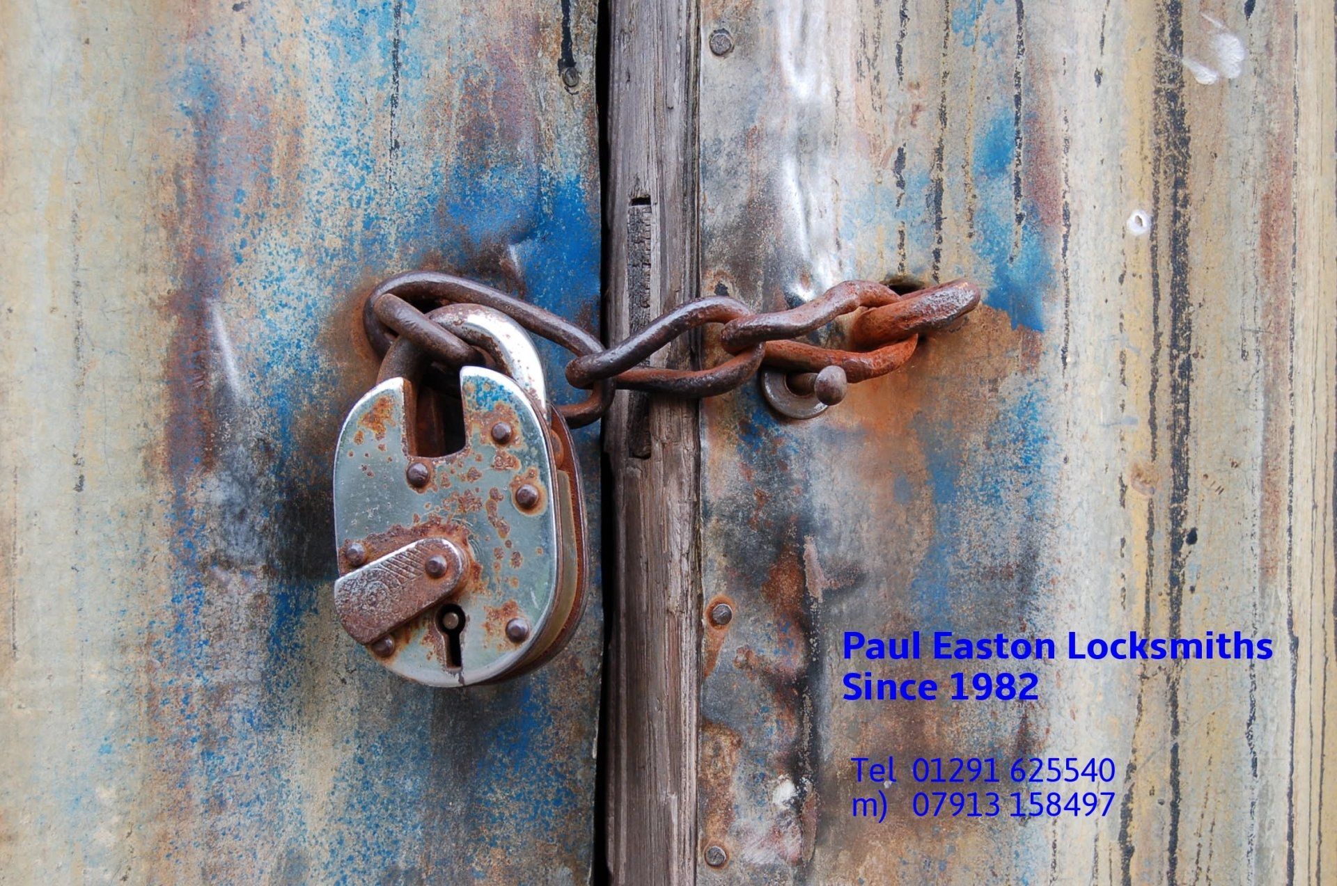 Paul Easton Locksmiths Established 1982 photograph of old chain and padlock
