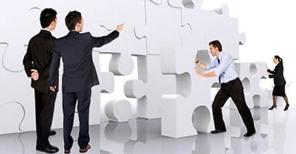 Co-Workers Building with Puzzle Blocks- Consultants In Coffs Harbour