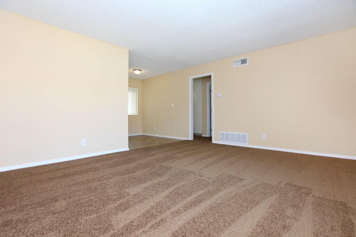 Living area with carpet.