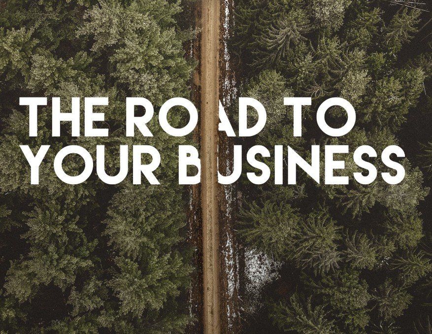 Road through a dense forest, text overlay: 