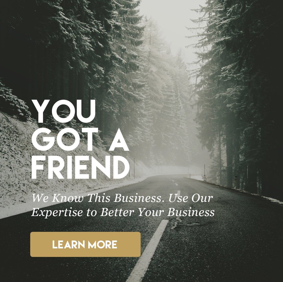 Road through trees with text: 