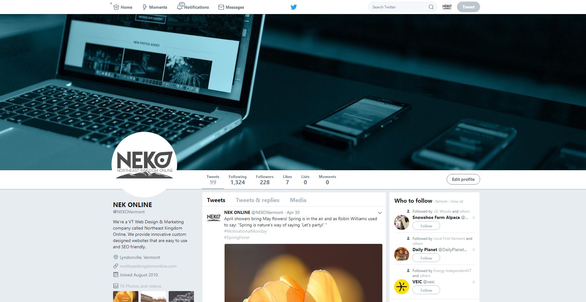 Twitter profile of NEKO Digital Agency with a laptop and mobile devices.