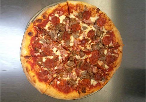 Pizza With a Lot of Toppings — Lynchburg, VA — Monte Carlo Italian Restaurant Pizza With a Lot of Toppings — Lynchburg, VA — Monte Carlo Italian Restaurant