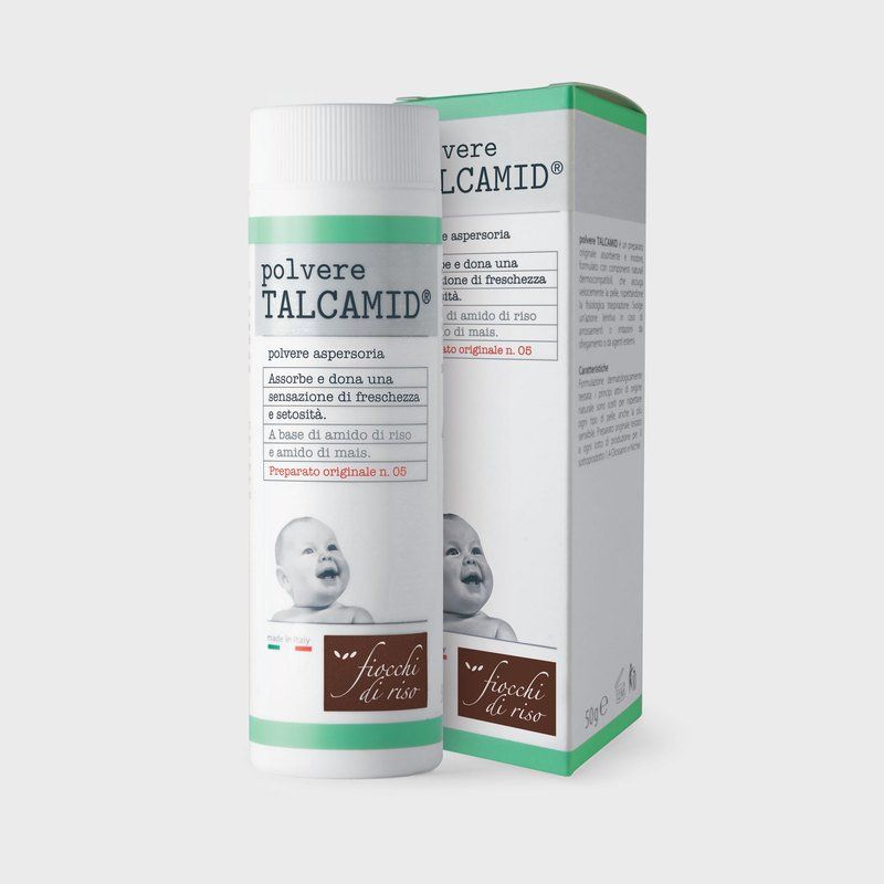 Flacone di talco per bambini Talcamid con la sua scatola, con un bambino sorridente sul davanti.