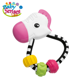 Sonaglio a forma di zebra per neonati con dettagli rosa, bianchi, neri, gialli e verdi.